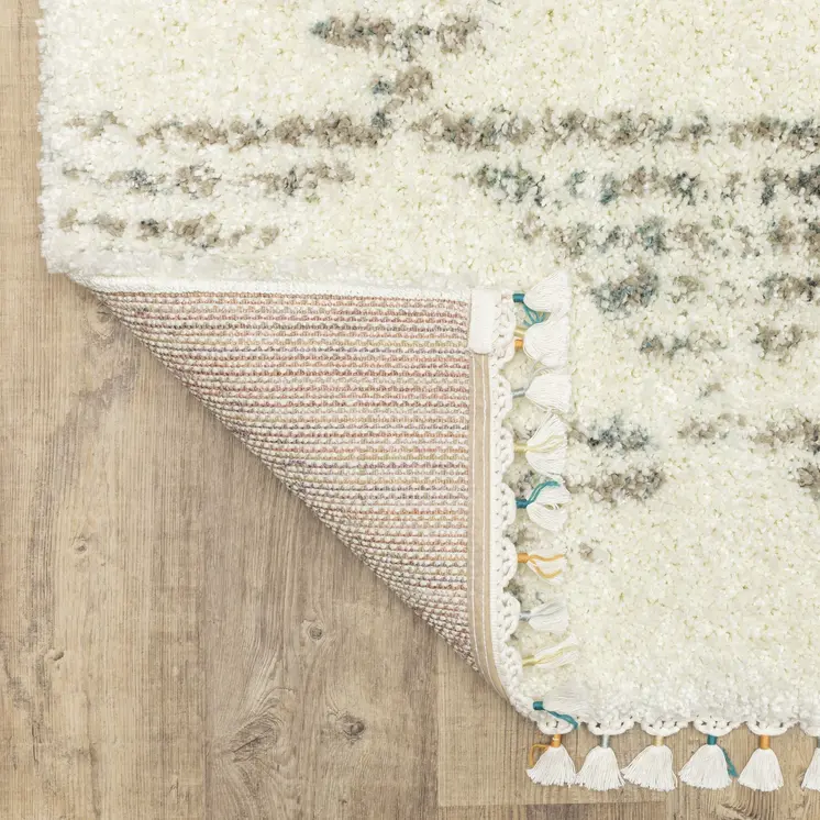 10' X 13' Ivory And Green Geometric Shag Area Rug With Fringe