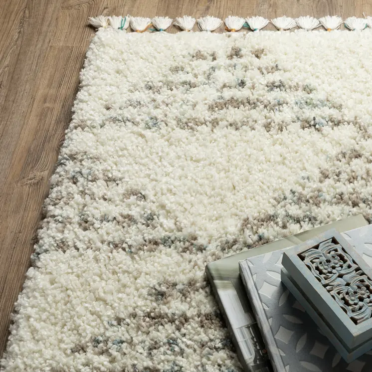 4' X 5' Ivory And Green Geometric Shag Area Rug With Fringe