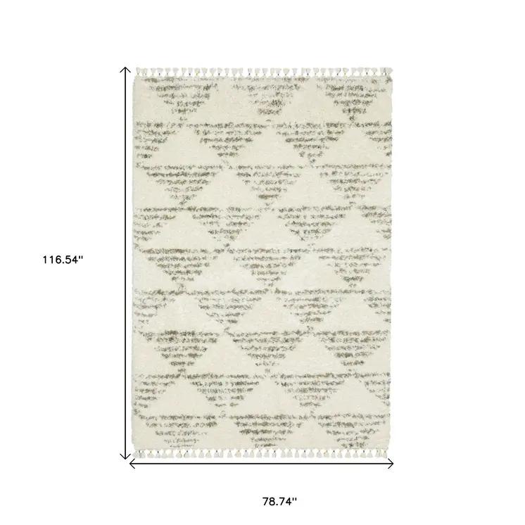 7' X 10' Ivory And Green Geometric Shag Area Rug With Fringe