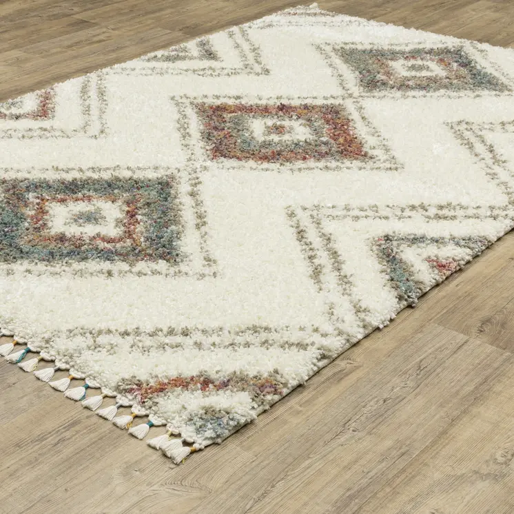 10' X 13' Ivory Red And Orange Southwestern Shag Area Rug With Fringe