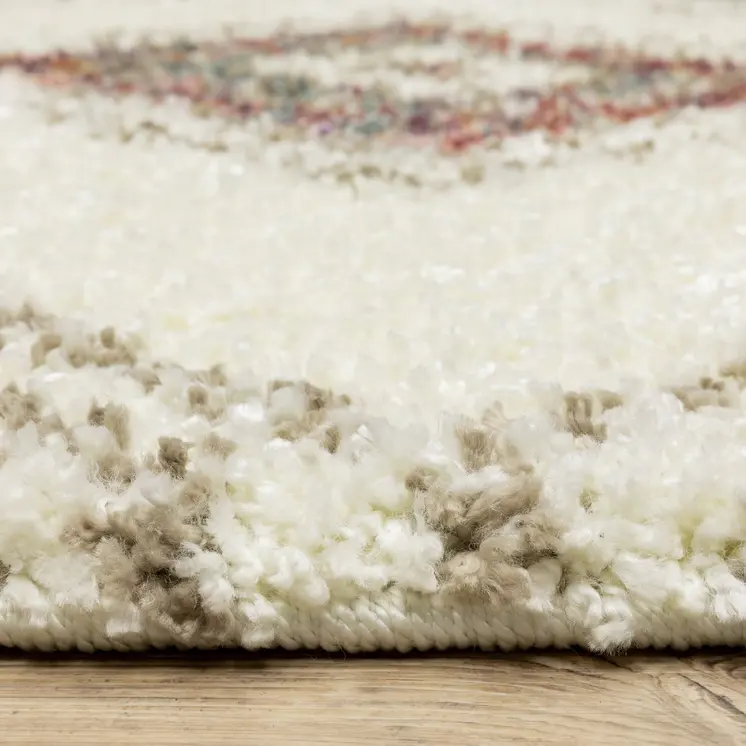 8' X 11' Ivory Red And Orange Southwestern Shag Area Rug With Fringe