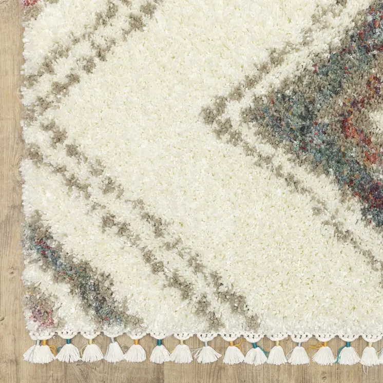 8' X 11' Ivory Red And Orange Southwestern Shag Area Rug With Fringe