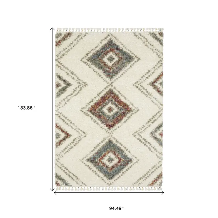 8' X 11' Ivory Red And Orange Southwestern Shag Area Rug With Fringe