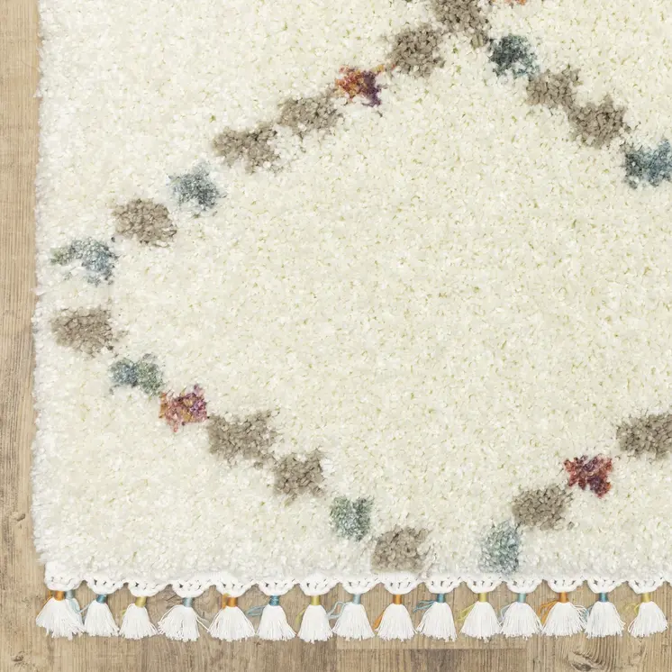 4' X 6' Ivory Tan And Gray Diamond Shag Area Rug With Fringe