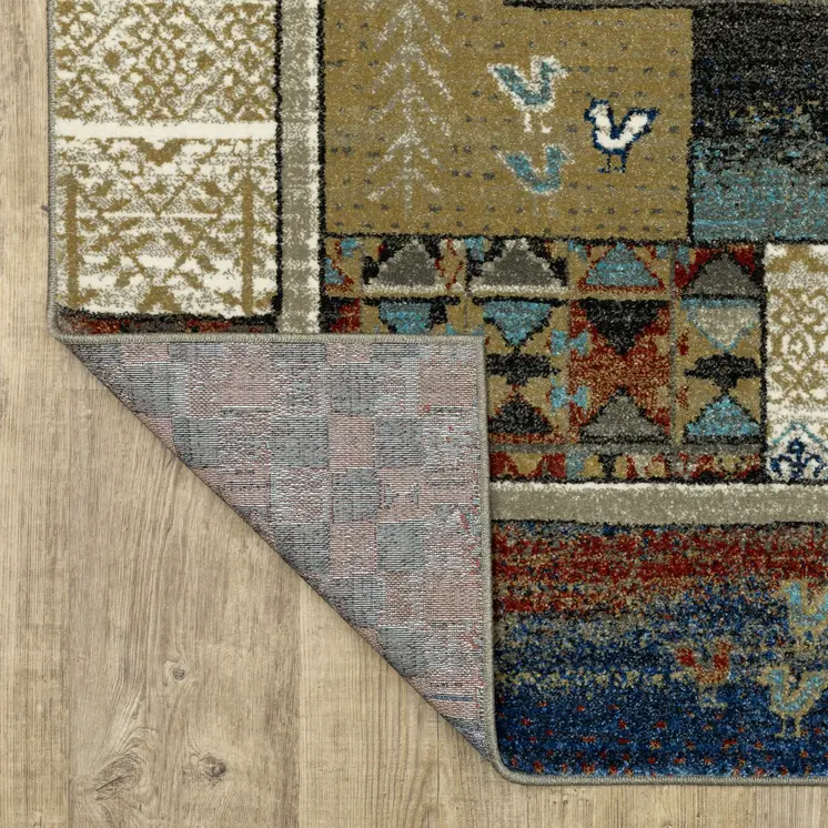 10' X 13' Brown Tan And Blue Patchwork Area Rug