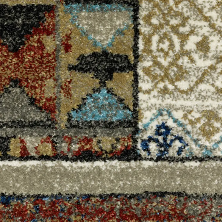 7' X 9' Brown Tan And Blue Patchwork Area Rug