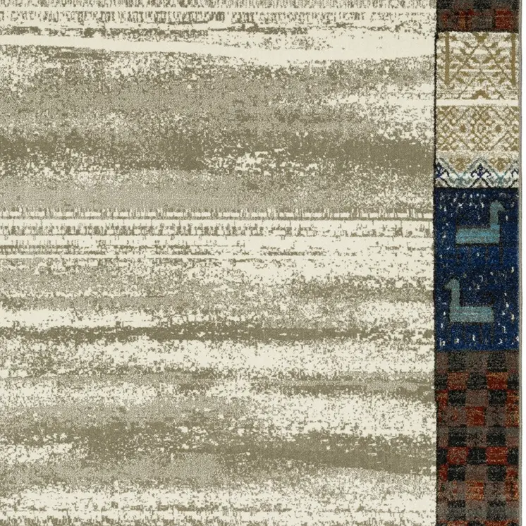 5' X 7' Ivory Tan And Blue Patchwork Area Rug