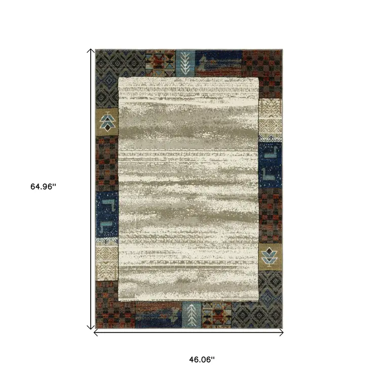 4' X 6' Ivory Tan And Blue Patchwork Area Rug