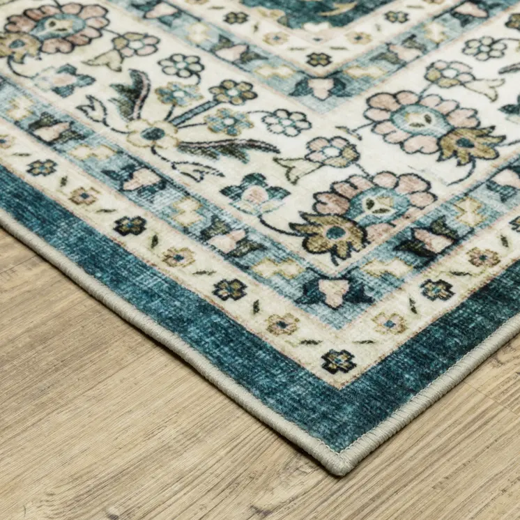 4' X 6' Teal And Ivory Oriental Distressed Area Rug