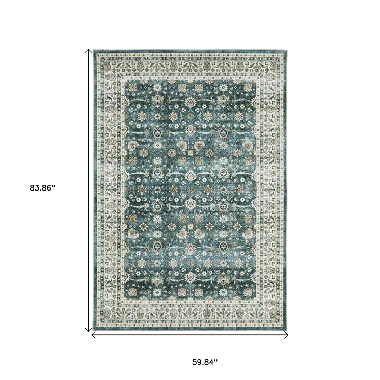 5' X 7' Teal And Ivory Oriental Distressed Area Rug