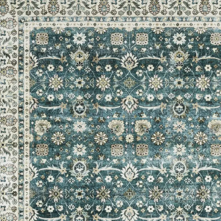 5' X 7' Teal And Ivory Oriental Distressed Area Rug