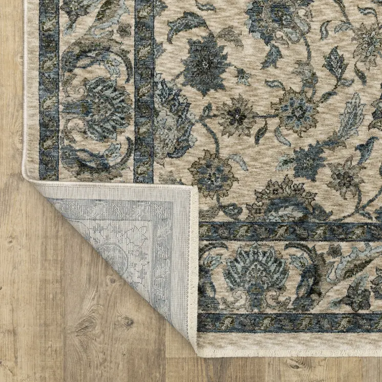 5' X 8' Beige And Blue Oriental Area Rug With Fringe