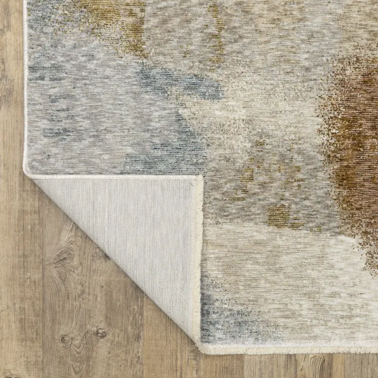 7' X 10' Beige And Rust Abstract Distressed Area Rug With Fringe