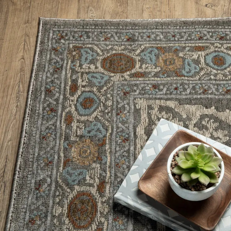 4' X 6' Blue Green And Ivory Medallion Area Rug
