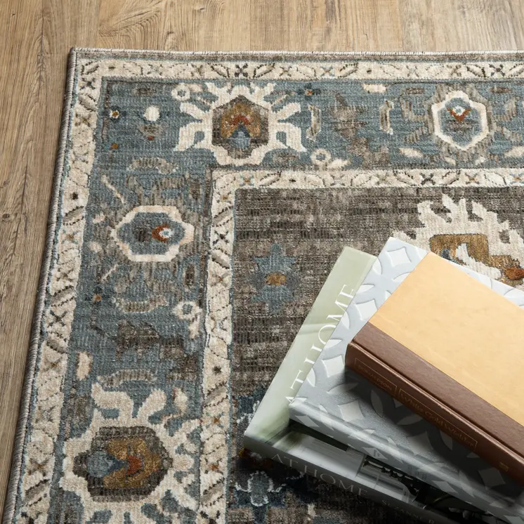 5' X 8' Blue Ivory And Gray Oriental Area Rug