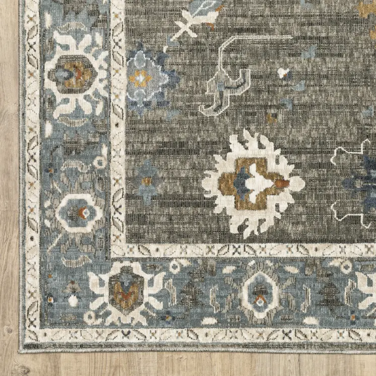 7' X 10' Blue Ivory And Gray Oriental Area Rug