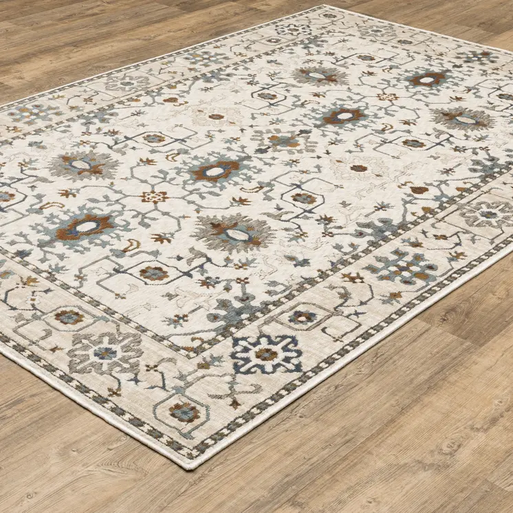 5' X 8' Ivory Burnt Orange And Blue Oriental Area Rug