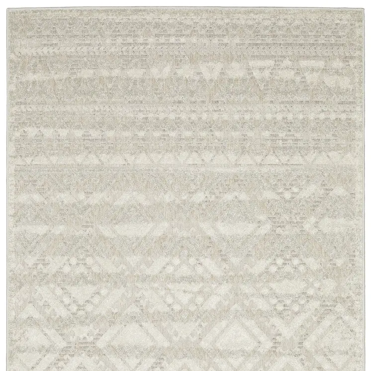 5' X 8' Beige And Ivory Tribal Area Rug