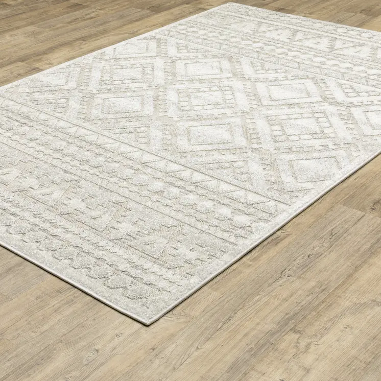5' X 8' Beige And Ivory Tribal Area Rug