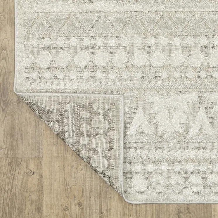 5' X 8' Beige And Ivory Tribal Area Rug