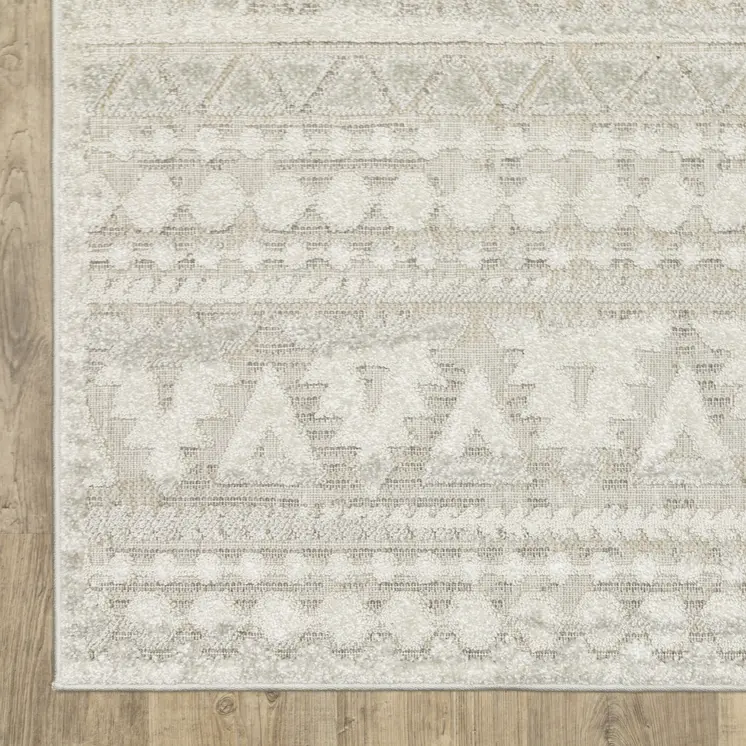 5' X 8' Beige And Ivory Tribal Area Rug