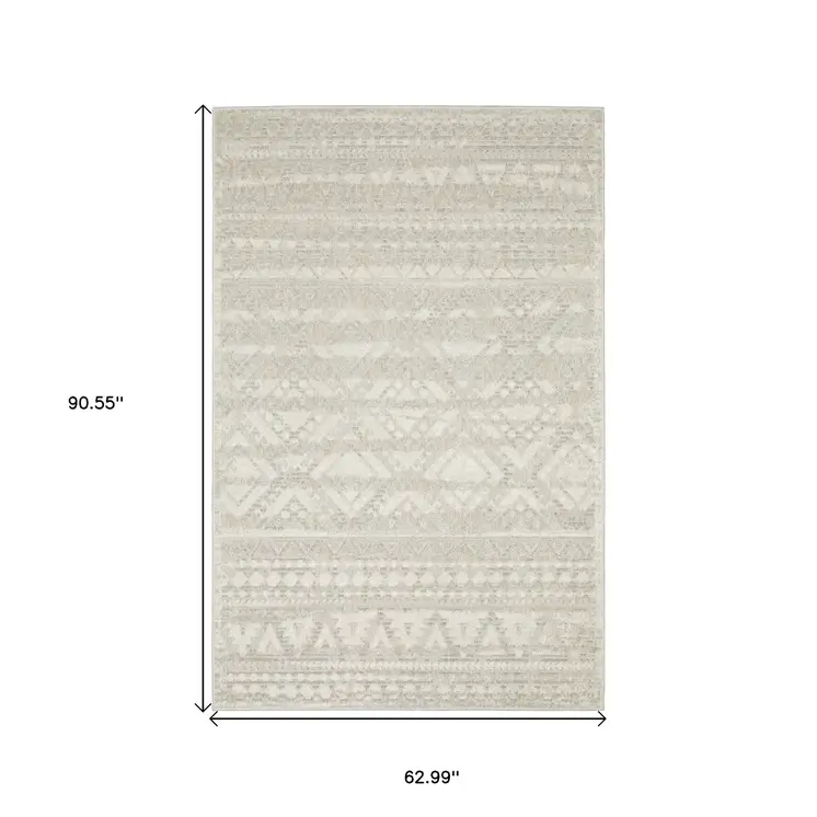 5' X 8' Beige And Ivory Tribal Area Rug