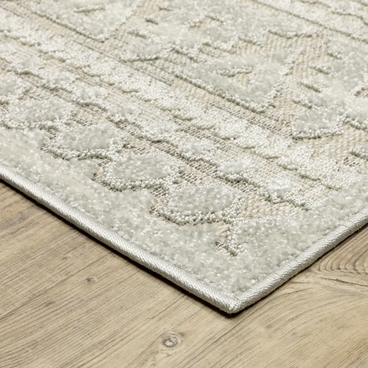 7' X 10' Beige And Ivory Tribal Area Rug