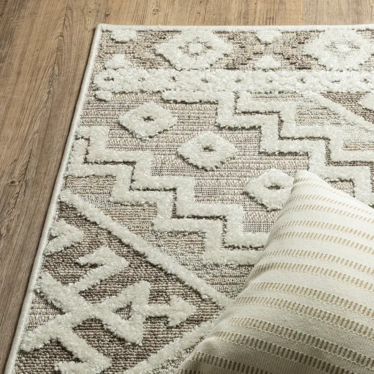 10' X 13' Beige And Brown Tribal Area Rug