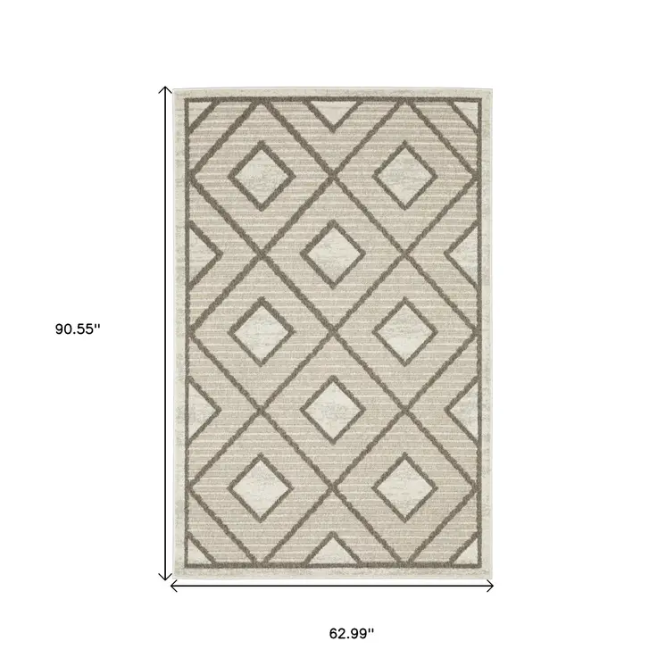 5' X 8' Beige And Brown Geometric Area Rug