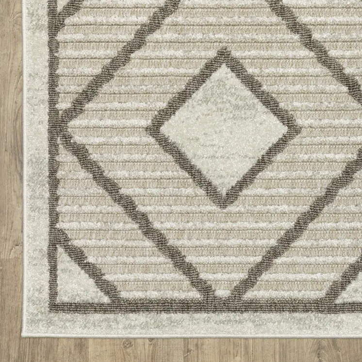 7' X 10' Beige And Brown Geometric Area Rug