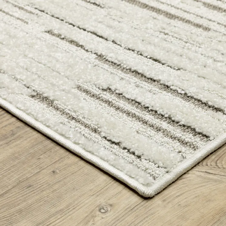 7' X 10' Ivory And Brown Striped Distressed Area Rug