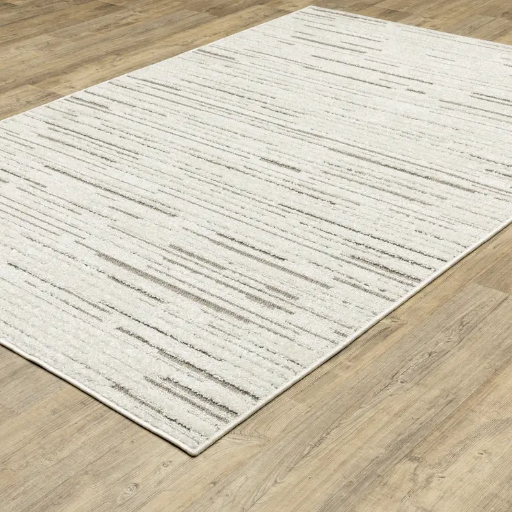 7' X 10' Ivory And Brown Striped Distressed Area Rug