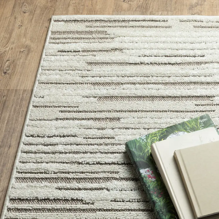8' X 11' Ivory And Brown Striped Distressed Area Rug