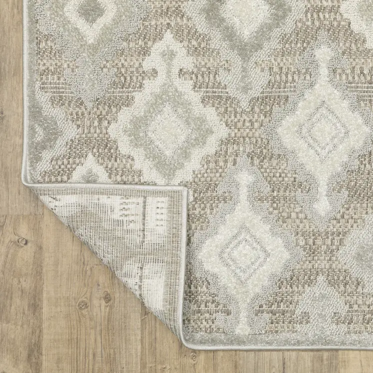 5' X 8' Beige And Gray Oriental Area Rug