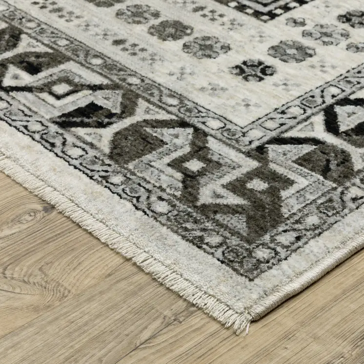 8' X 11' Ivory And Charcoal Oriental Area Rug With Fringe