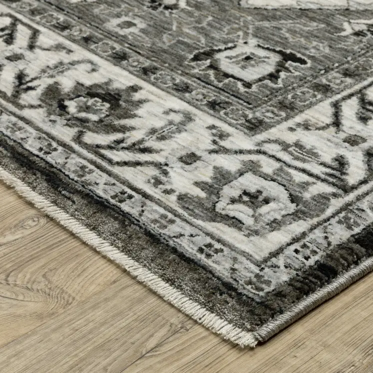 5' X 8' Charcoal And Ivory Medallion Area Rug With Fringe