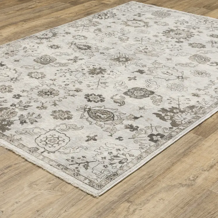 5' X 8' Ivory And Gray Oriental Area Rug With Fringe
