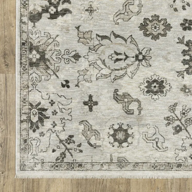 5' X 8' Ivory And Gray Oriental Area Rug With Fringe