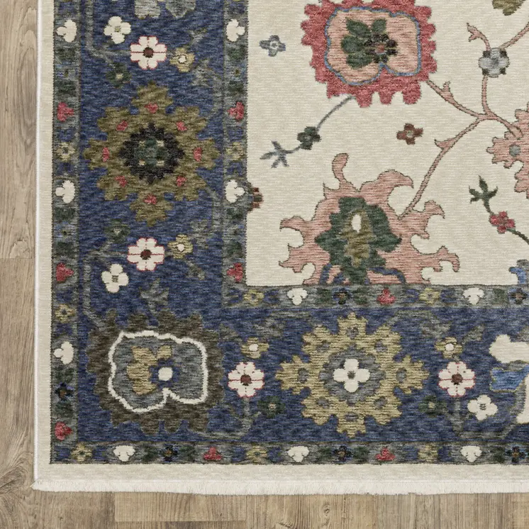 7' X 10' Blue And Ivory Floral Area Rug With Fringe