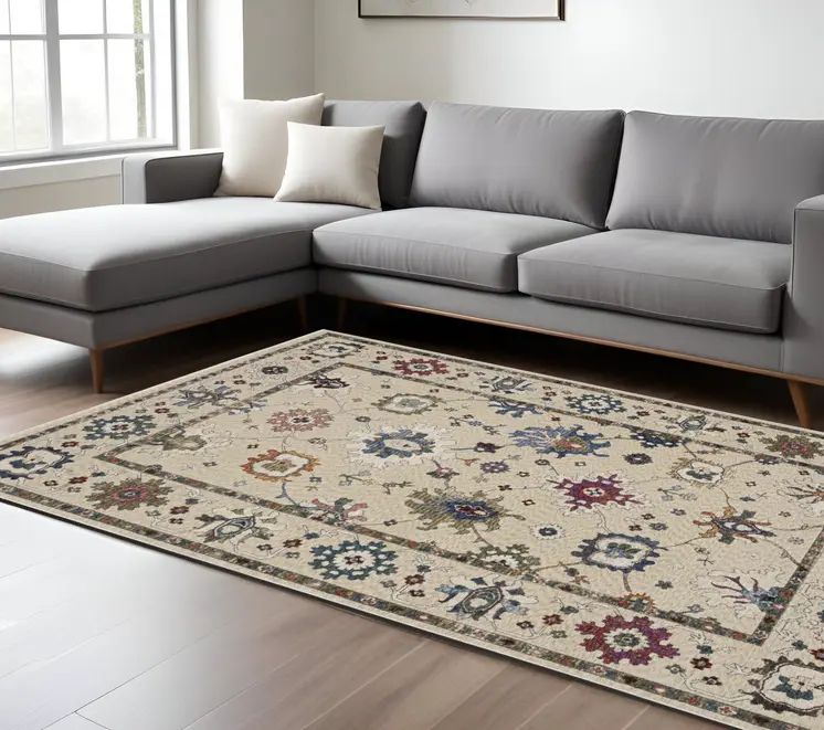 7' X 10' Ivory Blue And Light Brown Floral Area Rug With Fringe