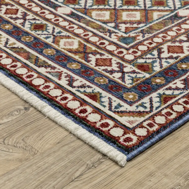 7' X 10' Ivory Red And Tan Diamond Area Rug With Fringe