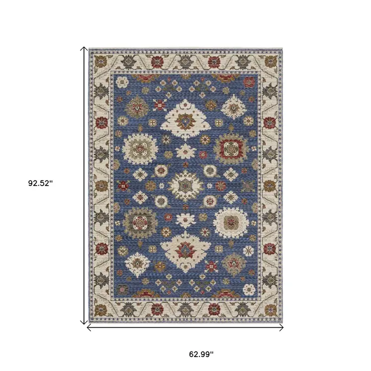 5' X 8' Blue And Ivory Floral Area Rug With Fringe