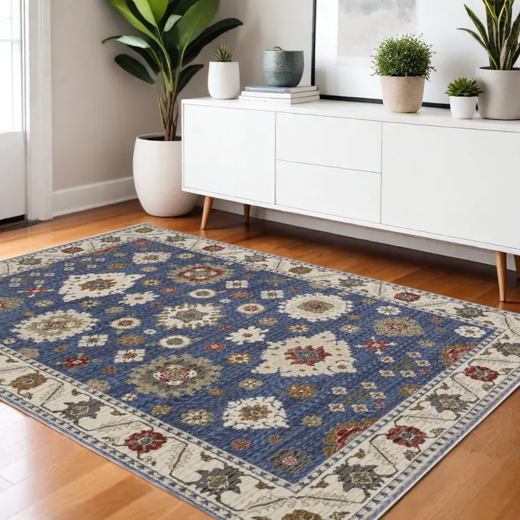 4' X 6' Blue And Ivory Floral Area Rug With Fringe