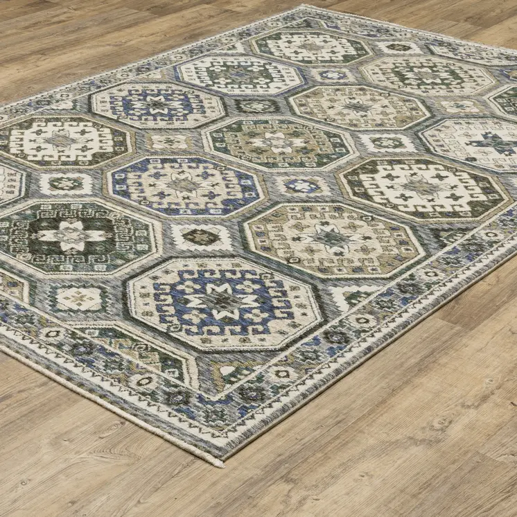 7' X 10' Ivory And Blue Medallion Area Rug With Fringe