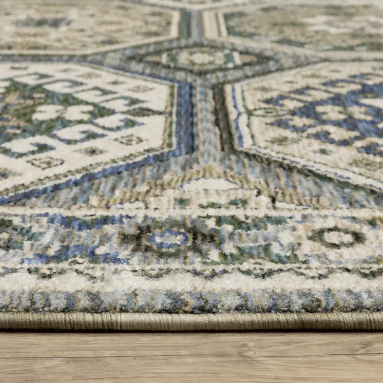 7' X 10' Ivory And Blue Medallion Area Rug With Fringe