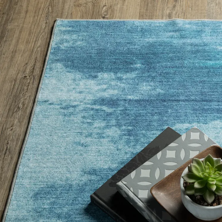 8' X 10' Sky Blue And Ivory Abstract Distressed Area Rug