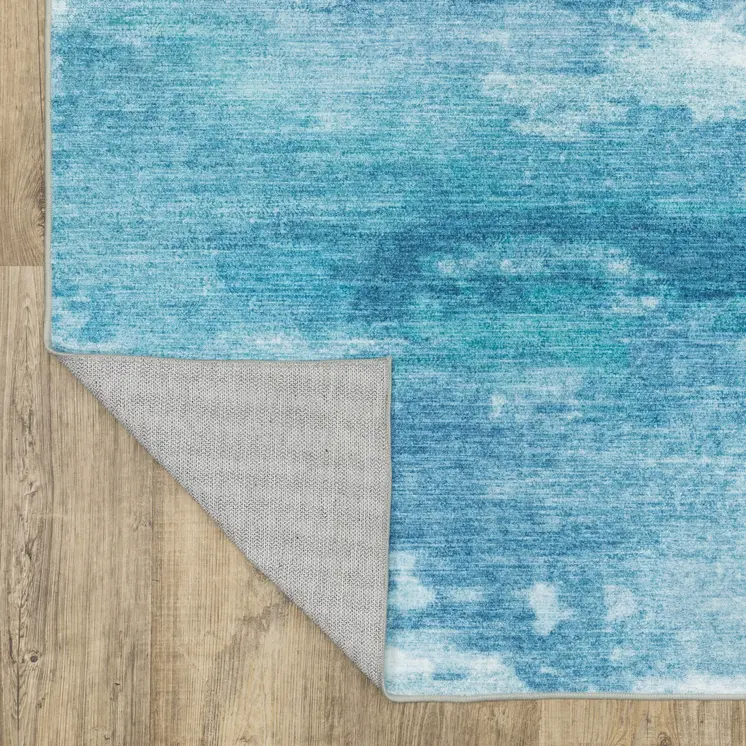 8' X 10' Sky Blue And Ivory Abstract Distressed Area Rug
