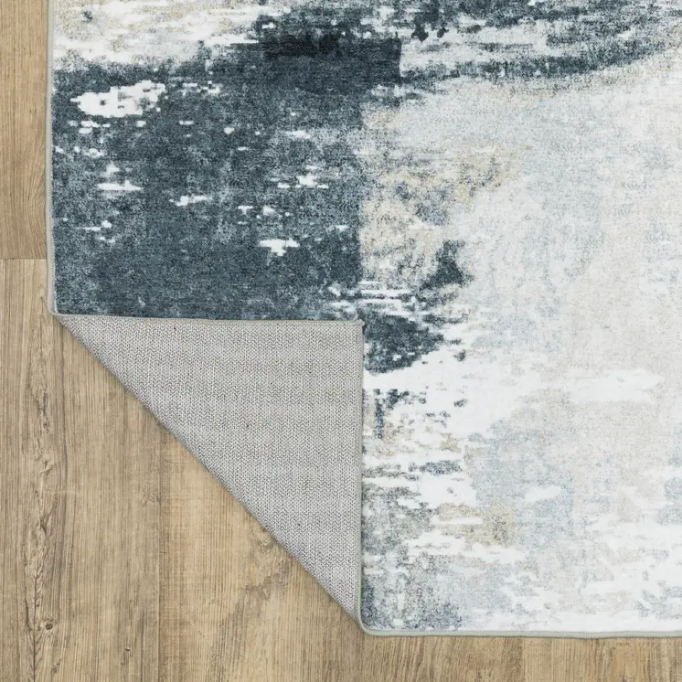 8' X 10' Ivory And Gray Abstract Distressed Area Rug