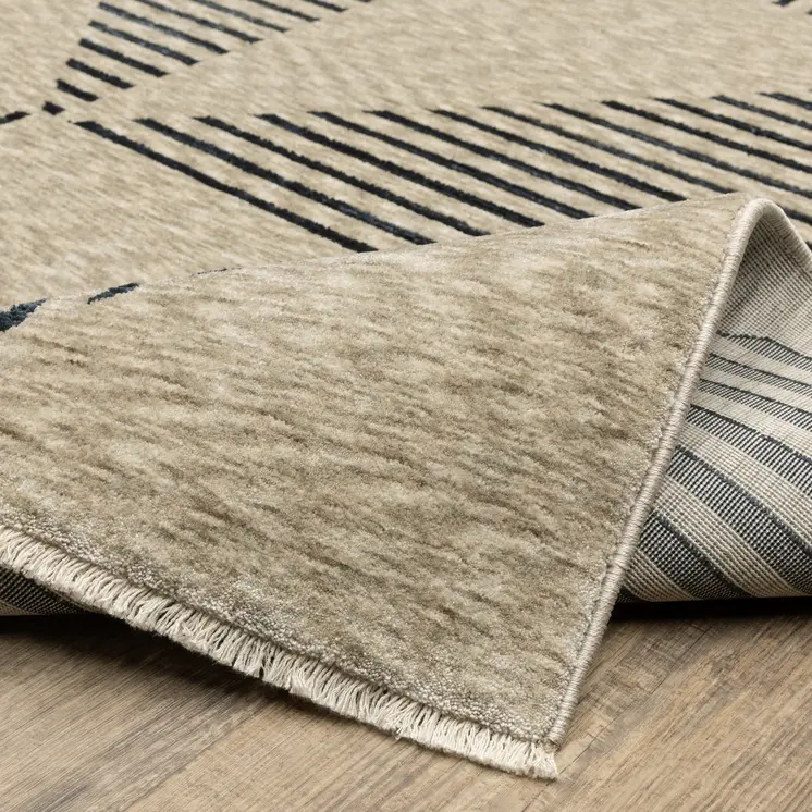 8' X 11' Beige Geometric Area Rug With Fringe