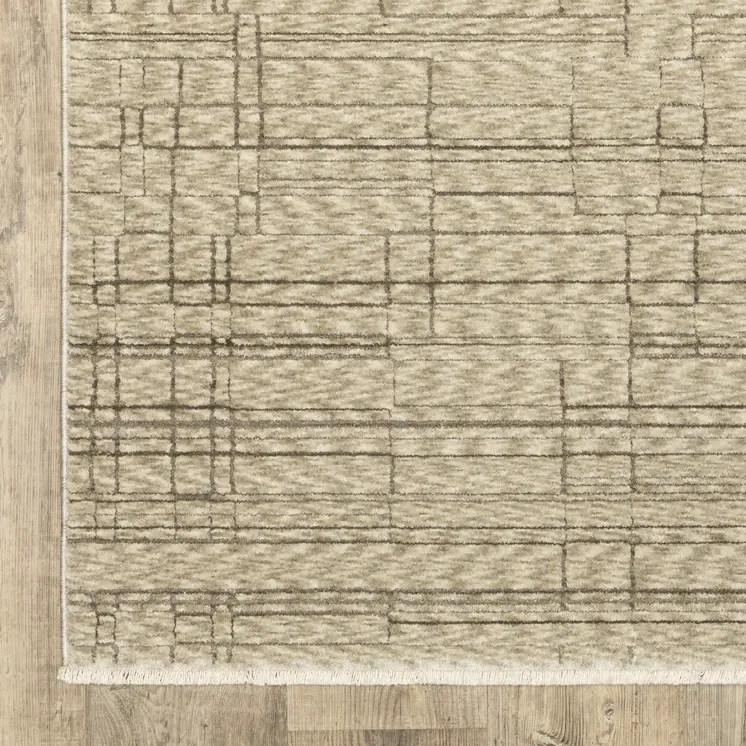 5' X 8' Beige And Brown Geometric Area Rug With Fringe